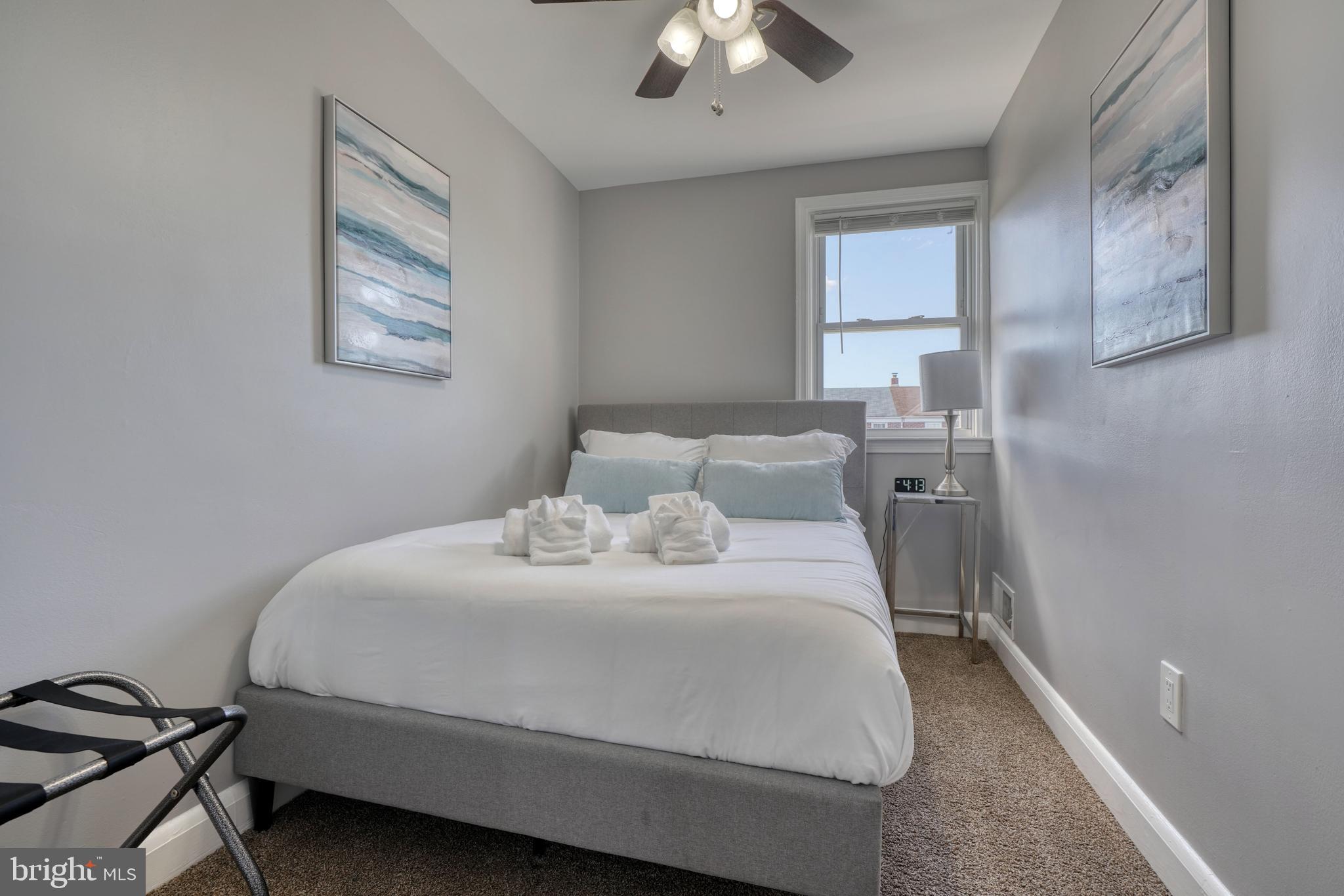 2124 Redthorn Road Baltimore, MD 21220 - Photo 19 of 39 a bedroom with a bed and window