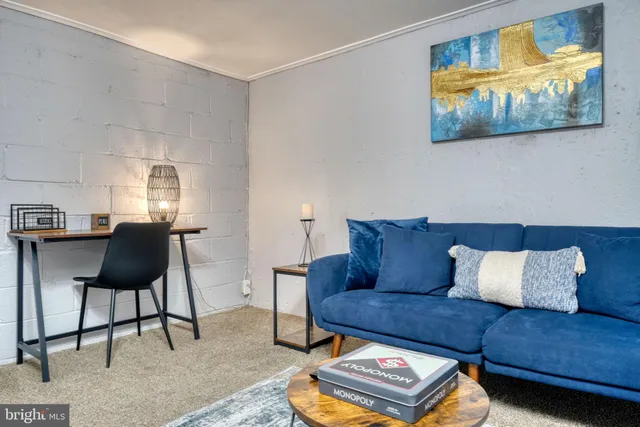 a living room with furniture and a couch