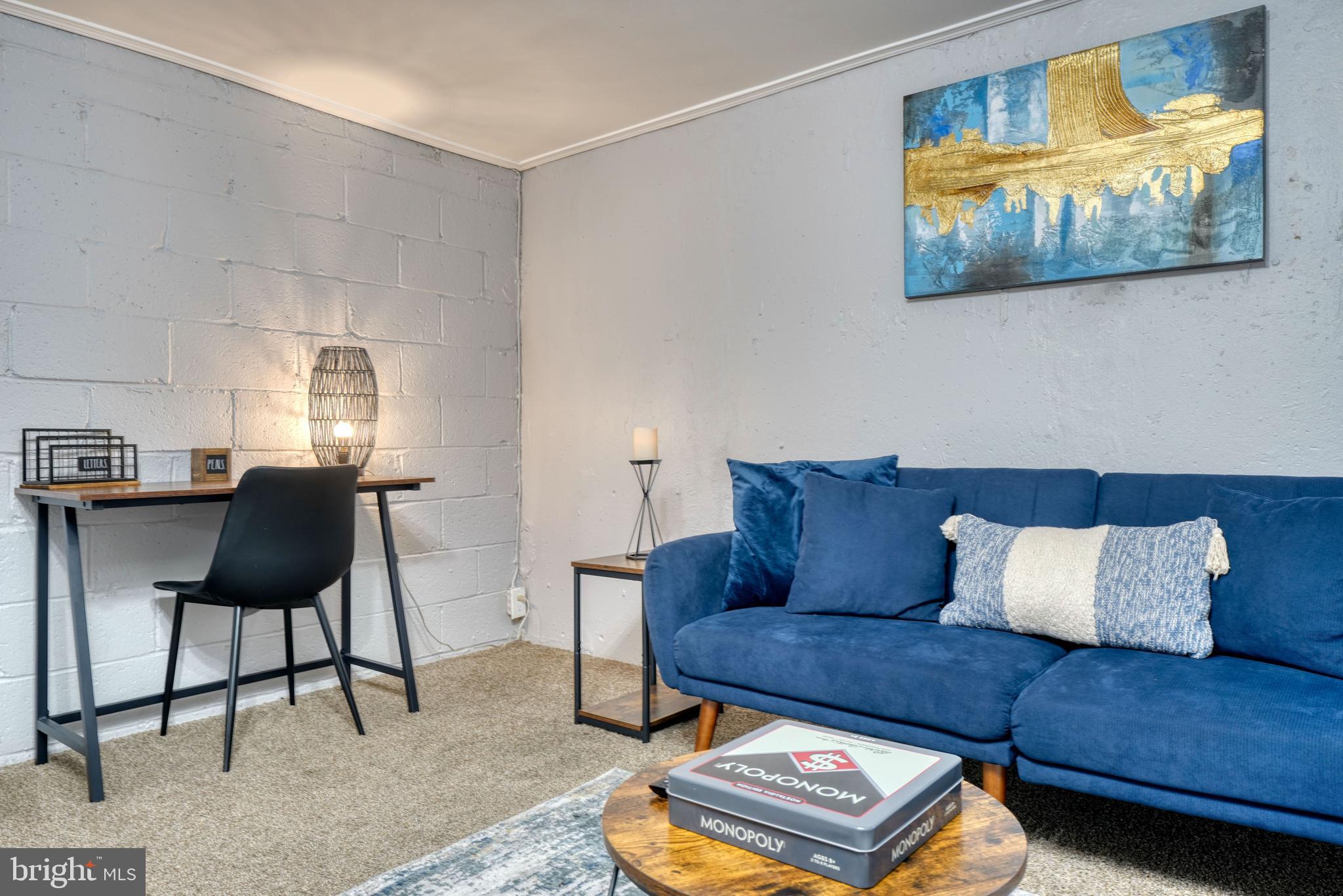 2124 Redthorn Road Baltimore, MD 21220 - Photo 23 of 39 a living room with furniture and a couch