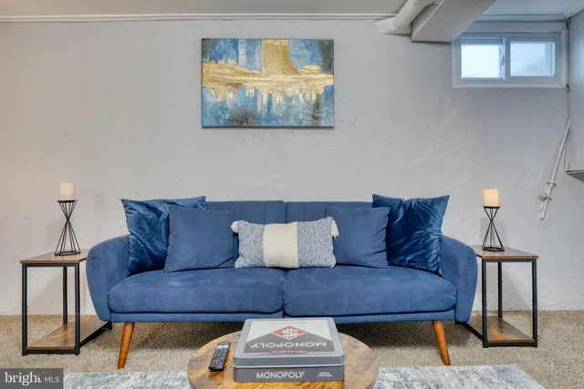 a living room with furniture and a couch