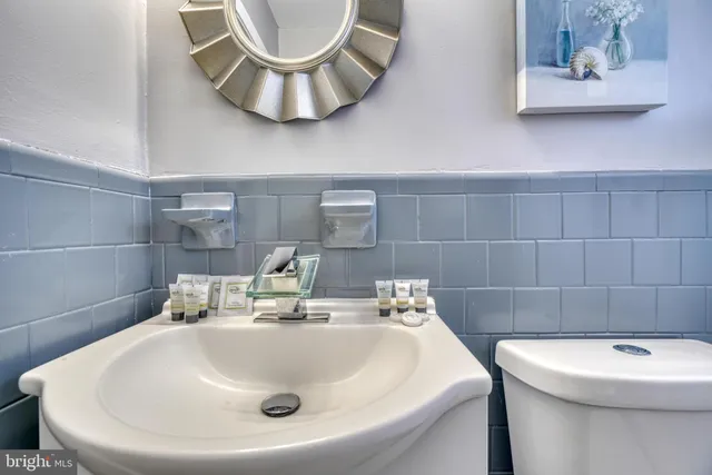 a bathroom with a sink and a toilet