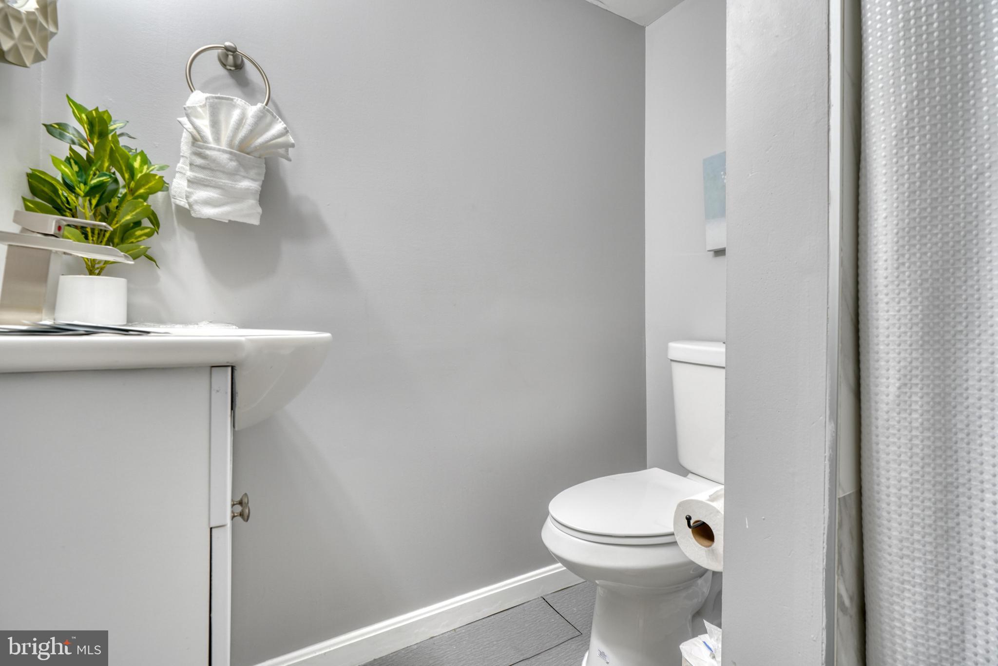 2124 Redthorn Road Baltimore, MD 21220 - Photo 30 of 39 a white toilet sitting next to a shower