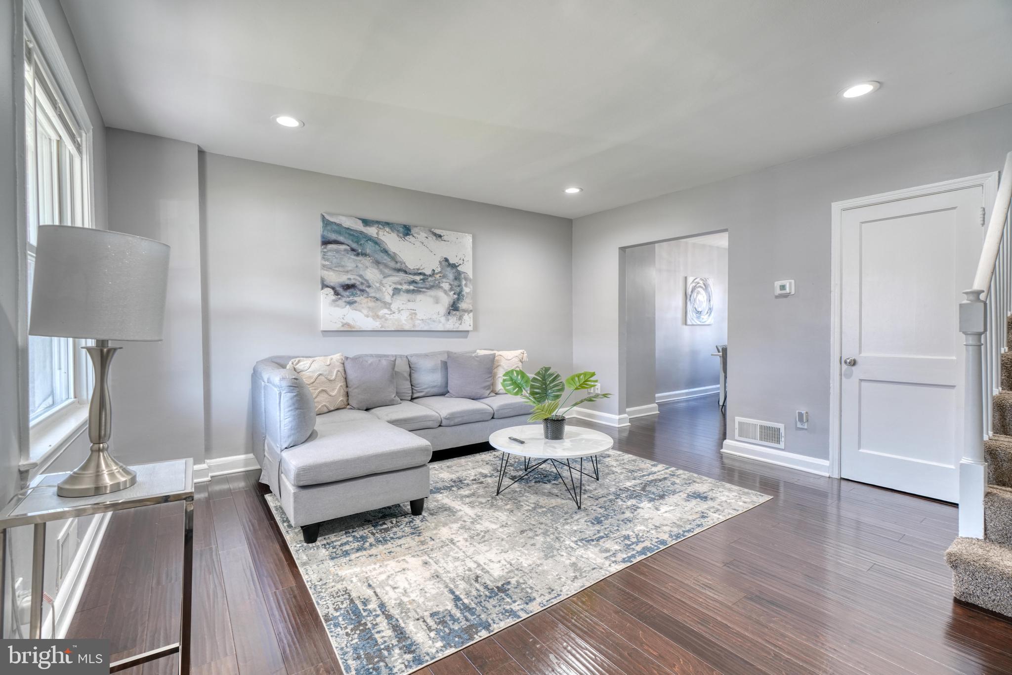 2124 Redthorn Road Baltimore, MD 21220 - Photo 6 of 39 a living room with furniture and a rug