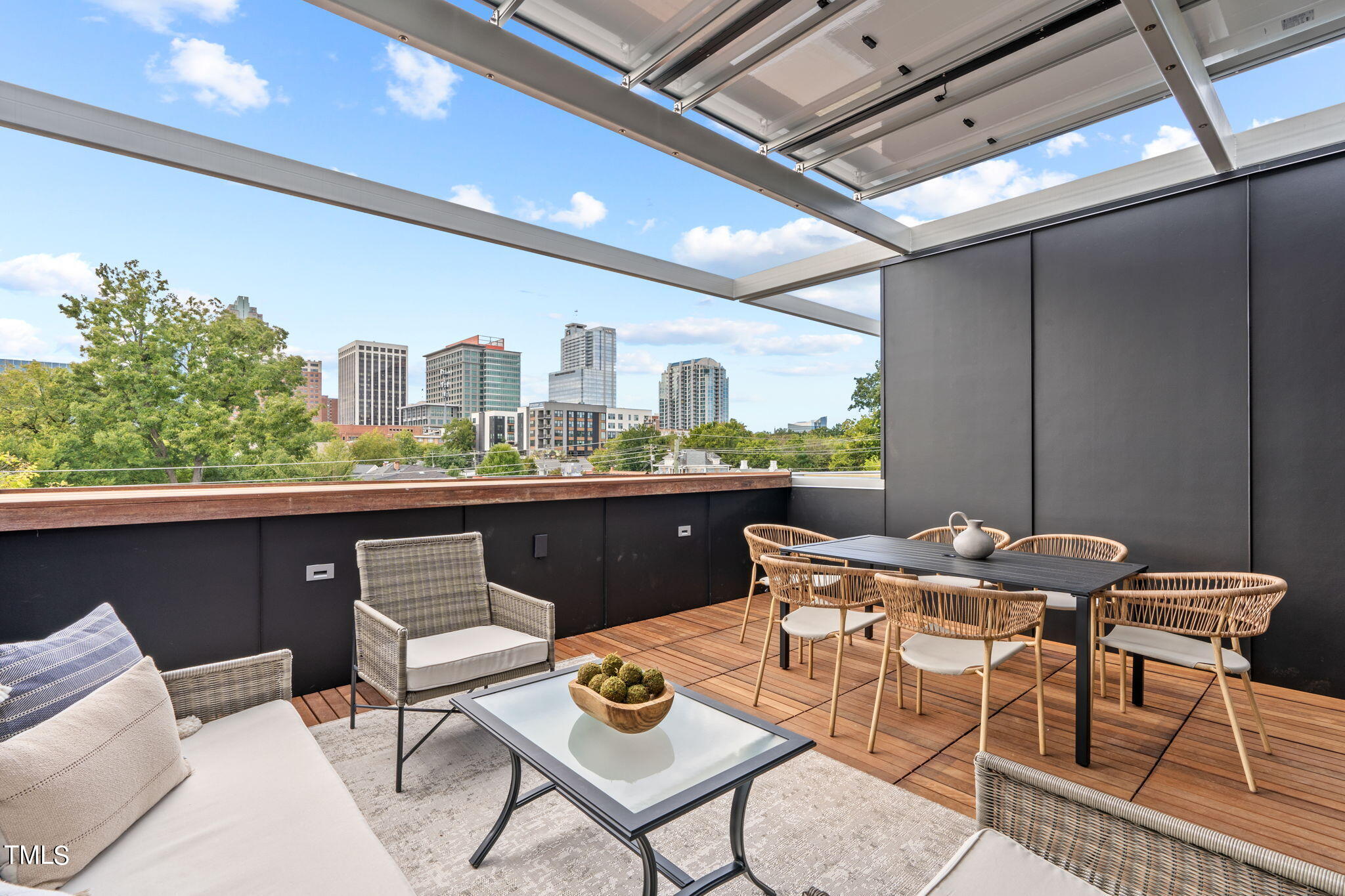 501 South Bloodworth Street, Unit 101 Raleigh, NC 27601 - Photo 1 of 55 a outdoor space with a table and chairs