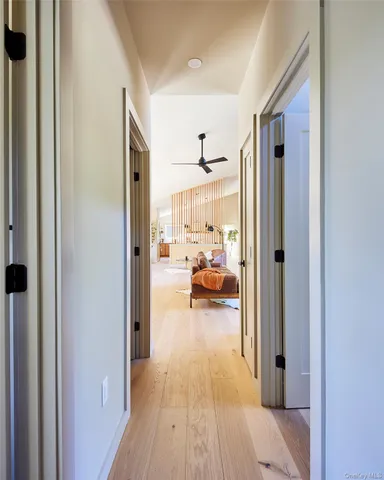 a work room with table and a window