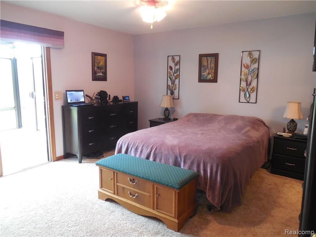 3955 Innisfree Road Howell, MI 48855 - Photo 5 of 43 Master bedroom with direct access to 4 season sun room