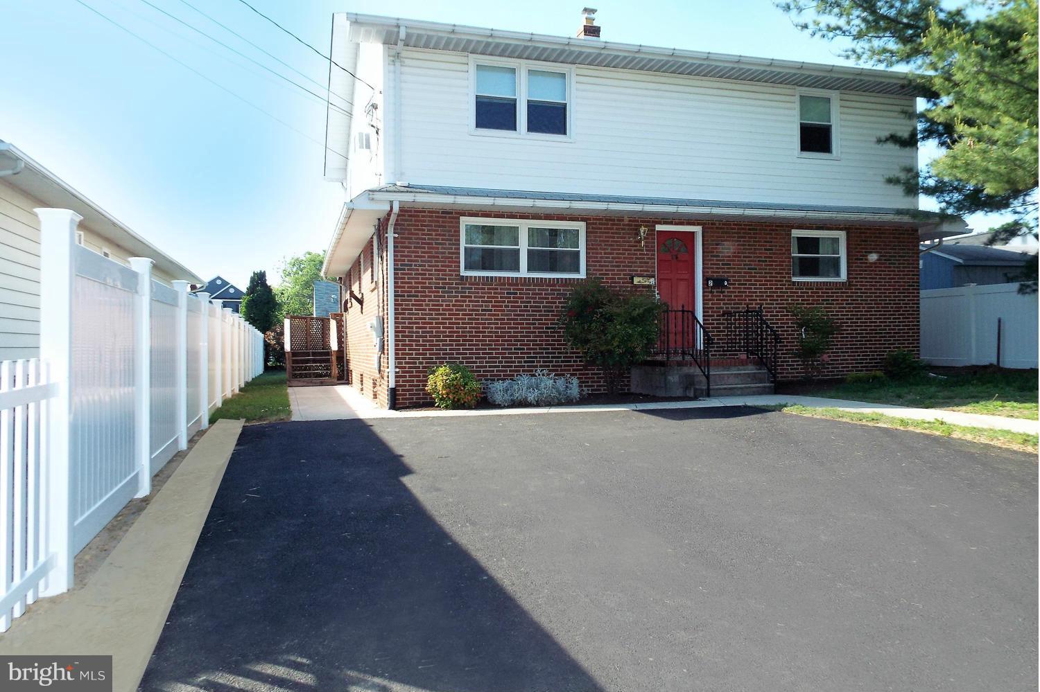 126 Carroll Road Pasadena, MD 21122 - Photo 2 of 28 Wide Paved Multi-Vehicle Parking Pad