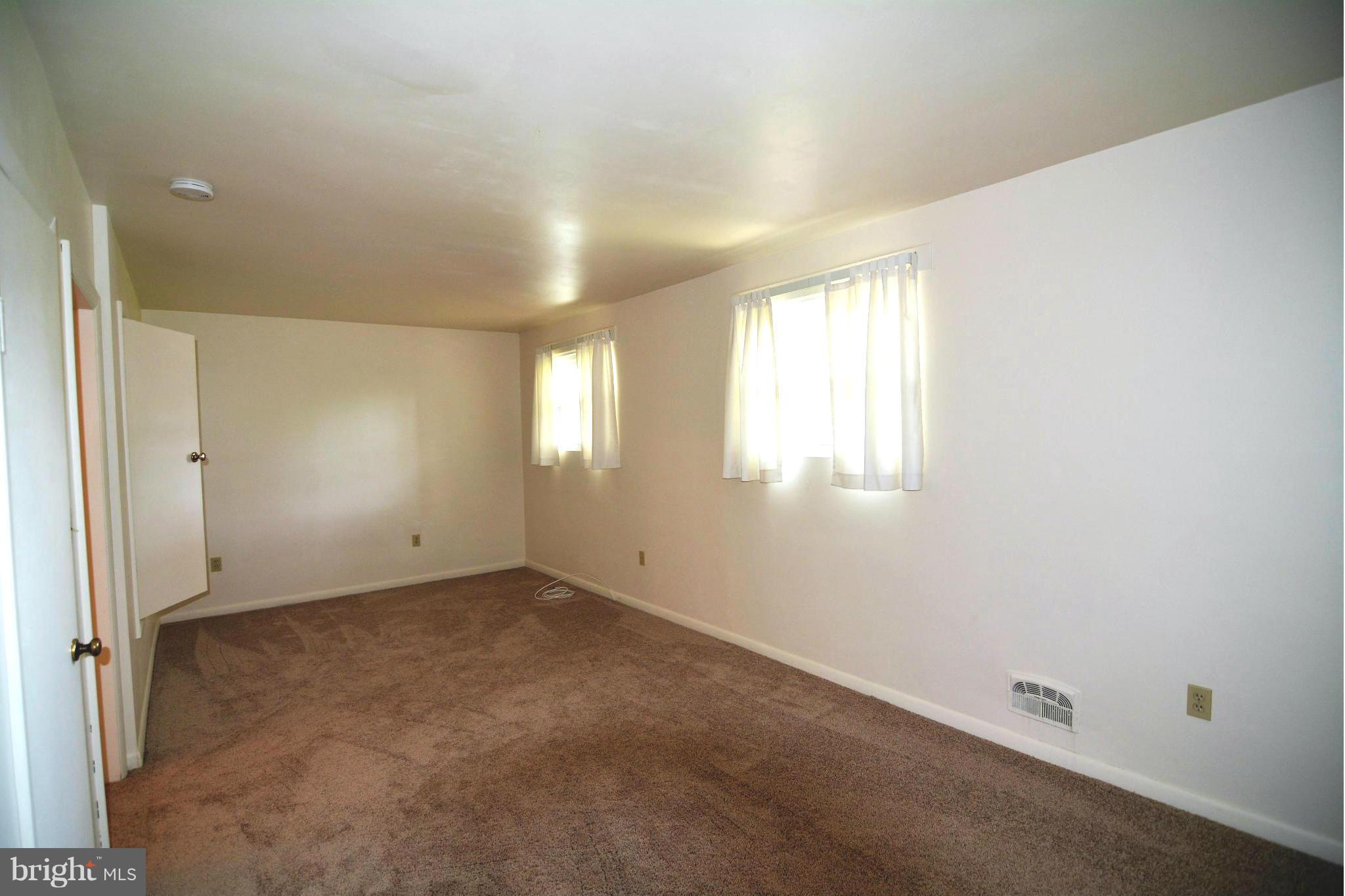 126 Carroll Road Pasadena, MD 21122 - Photo 17 of 28 Bright and Airy Main Level Bedroom