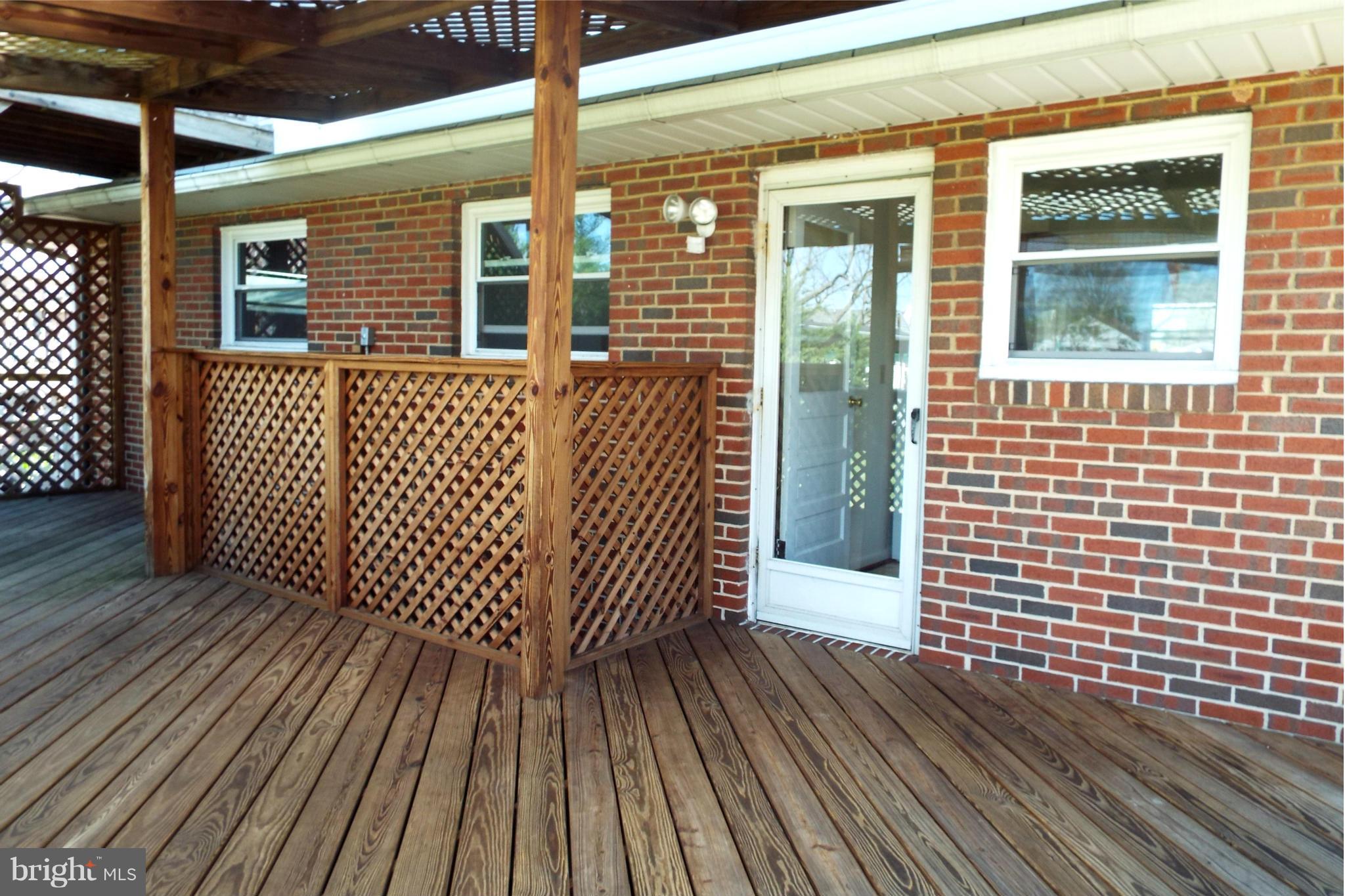 126 Carroll Road Pasadena, MD 21122 - Photo 19 of 28 Fun Rear Deck for Relaxing and Dining