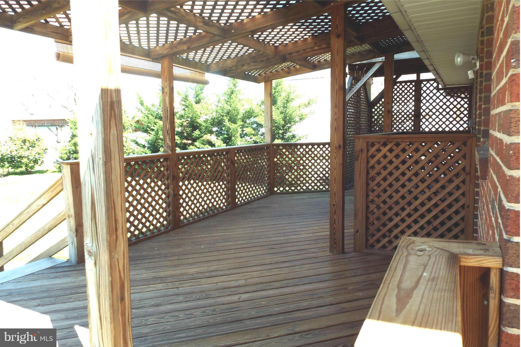 126 Carroll Road Pasadena, MD 21122 - Photo 20 of 28 Pergola-Styled Lattice Roof and Railings