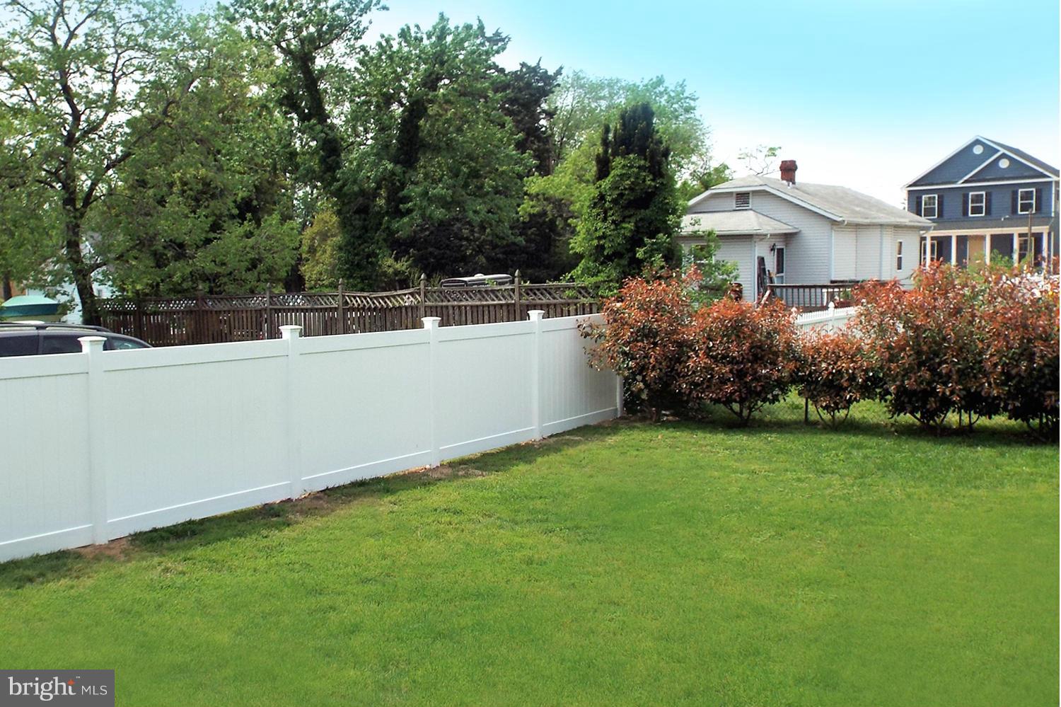 126 Carroll Road Pasadena, MD 21122 - Photo 4 of 28 Grassy Partially Fenced Yard