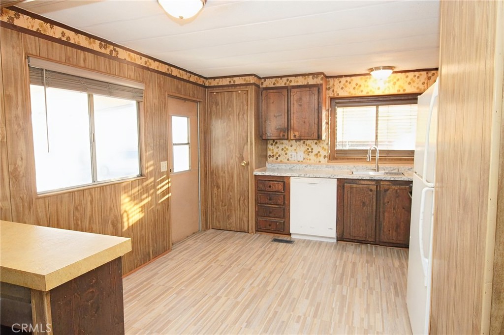 1155 Pease Road, Unit 24 Yuba City, CA 95991 - Photo 11 of 30 a view of a kitchen with a sink and a window