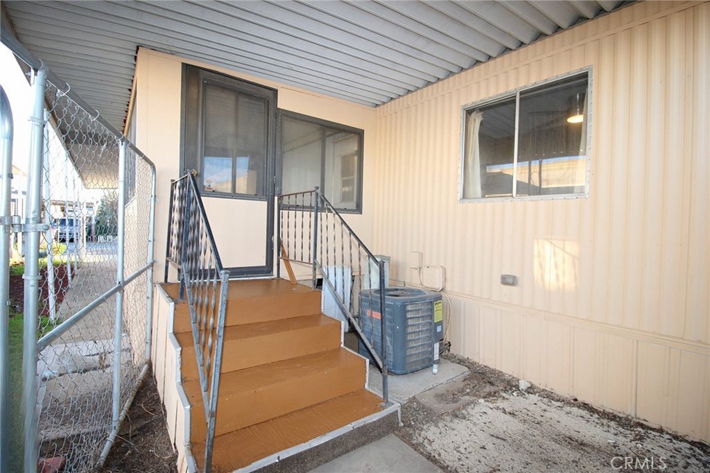 1155 Pease Road, Unit 24 Yuba City, CA 95991 - Photo 23 of 30 a view of entryway with wooden floor