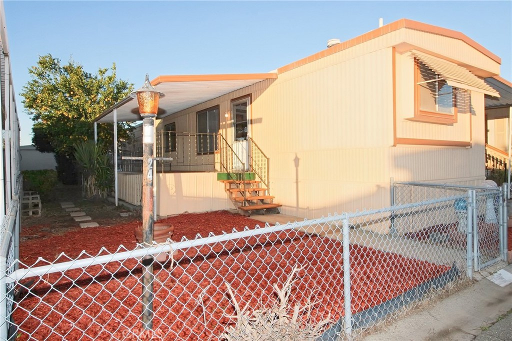 1155 Pease Road, Unit 24 Yuba City, CA 95991 - Photo 3 of 30 a view of a house with a street