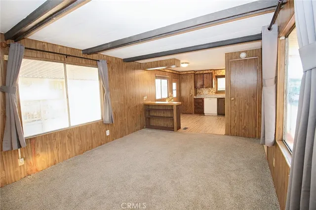 a kitchen with a refrigerator stove and sink