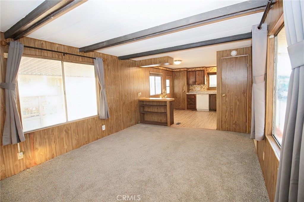 1155 Pease Road, Unit 24 Yuba City, CA 95991 - Photo 6 of 30 a view of an empty room with a window