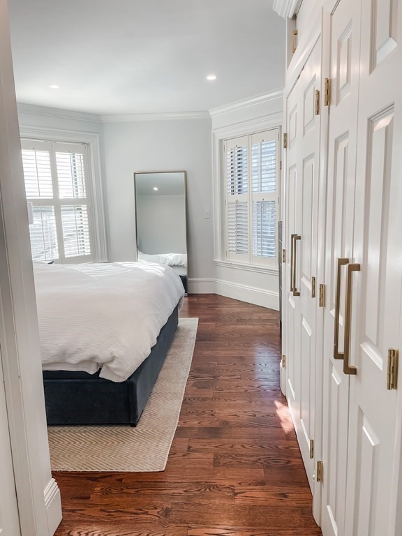 296 Commonwealth Avenue, Unit 5 Boston, MA 02115 - Photo 15 of 29 a large bedroom with a bed and a window