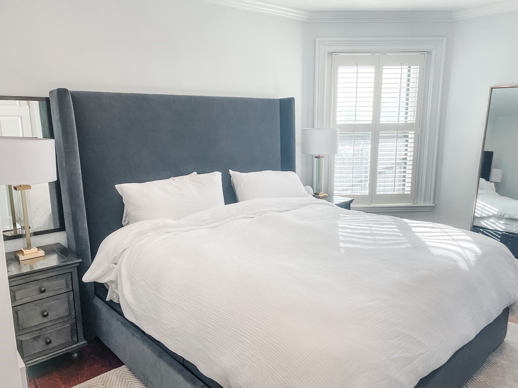 296 Commonwealth Avenue, Unit 5 Boston, MA 02115 - Photo 16 of 29 a large white bed in a white room
