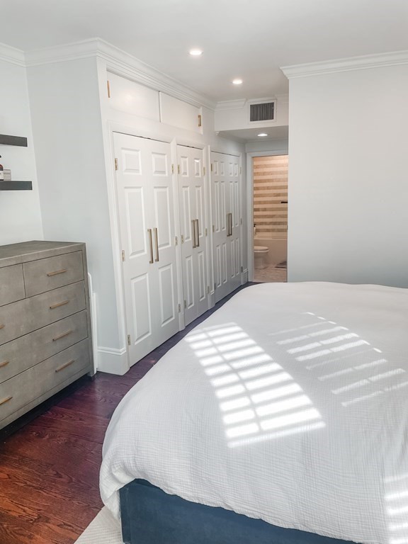 296 Commonwealth Avenue, Unit 5 Boston, MA 02115 - Photo 17 of 29 a bedroom with a bed and a dresser