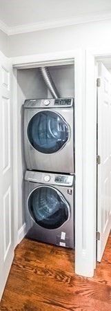 296 Commonwealth Avenue, Unit 5 Boston, MA 02115 - Photo 24 of 29 a kitchen with a stove and a refrigerator