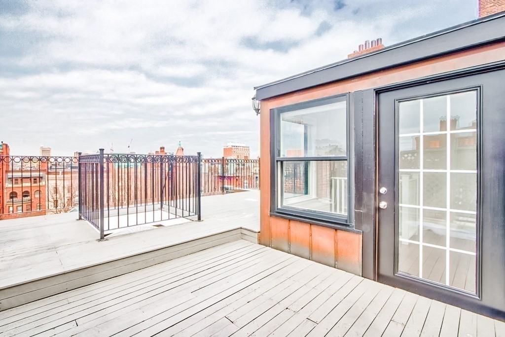 296 Commonwealth Avenue, Unit 5 Boston, MA 02115 - Photo 3 of 29 a view of a balcony with wooden floor