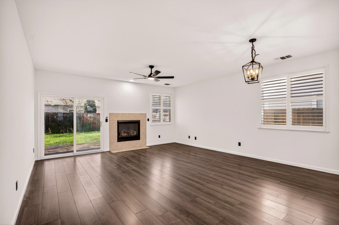 1825 Vermont Street Gridley, CA 95948 - Photo 11 of 57 a view of empty room with wooden floor and fan