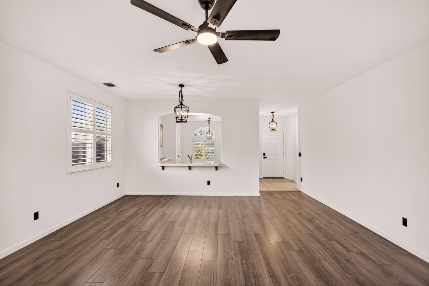 1825 Vermont Street Gridley, CA 95948 - Photo 14 of 57 a view of an empty room with wooden floor and a window