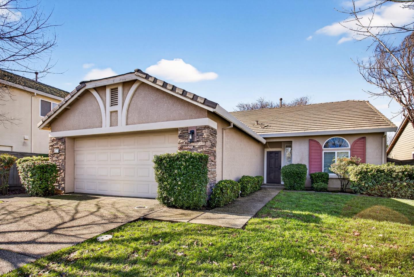 1825 Vermont Street Gridley, CA 95948 - Photo 2 of 57 a front view of a house with a yard and garage