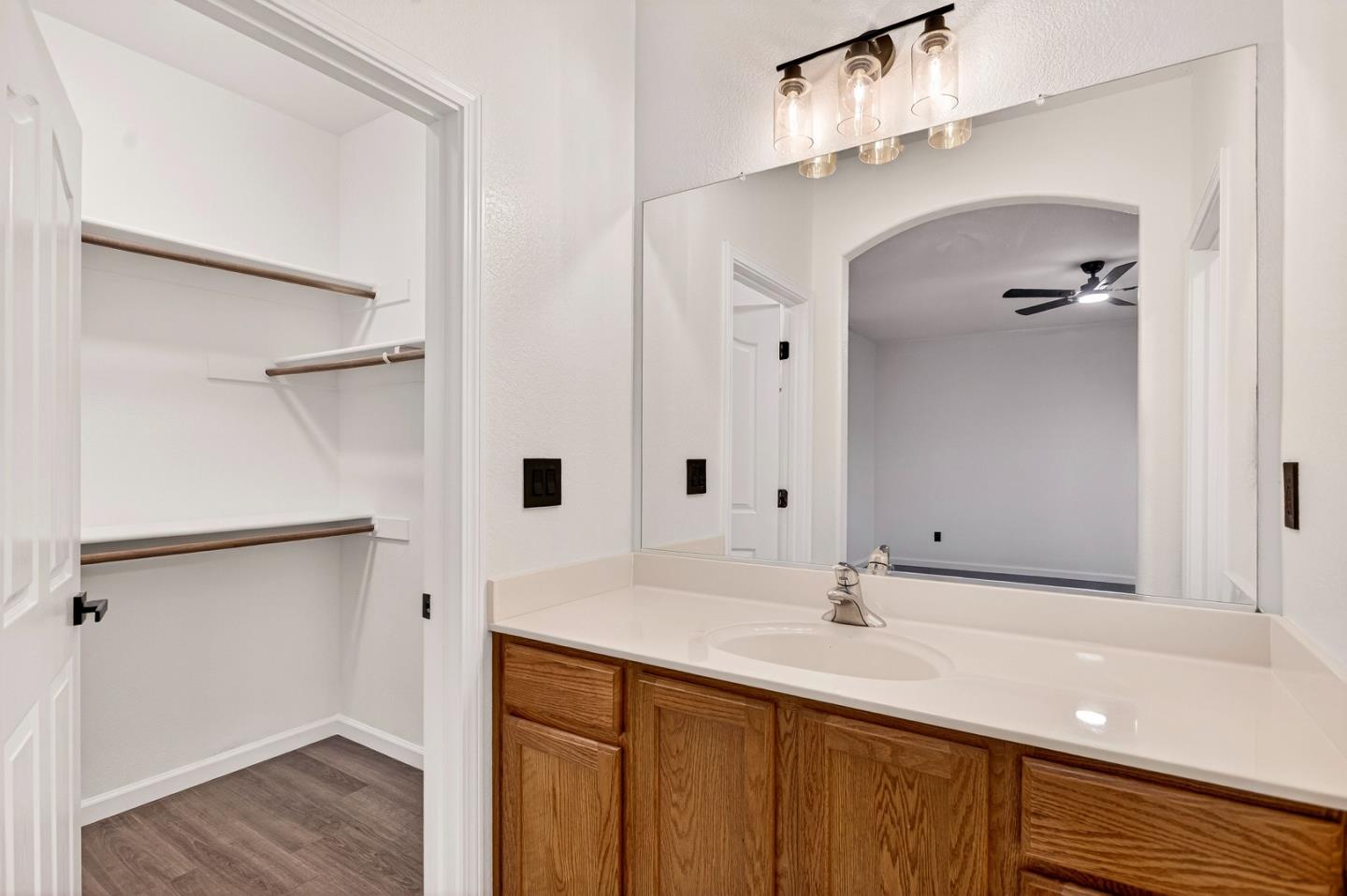 1825 Vermont Street Gridley, CA 95948 - Photo 26 of 57 a bathroom with a sink and a mirror