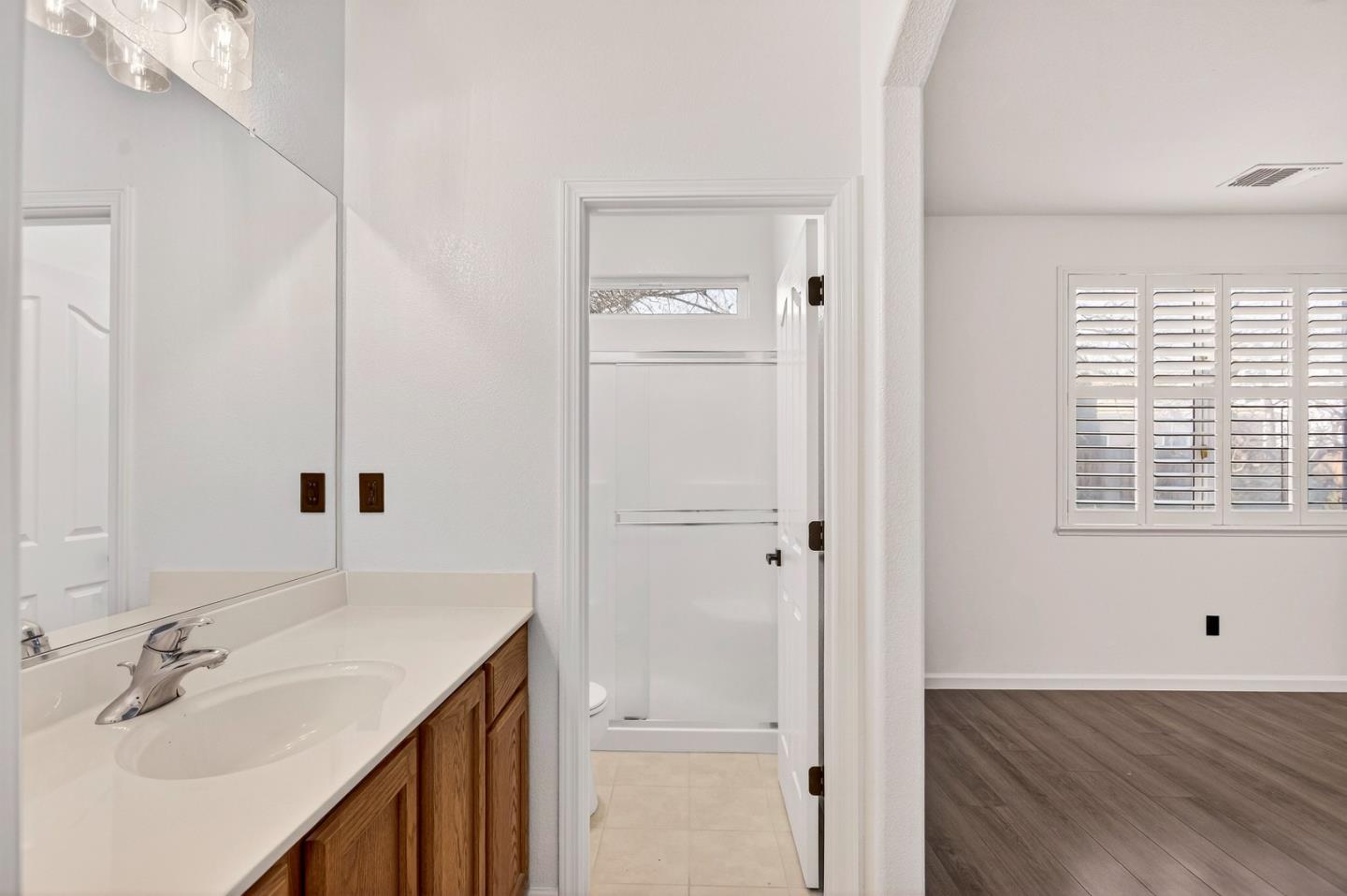 1825 Vermont Street Gridley, CA 95948 - Photo 28 of 57 a bathroom with a sink and a mirror