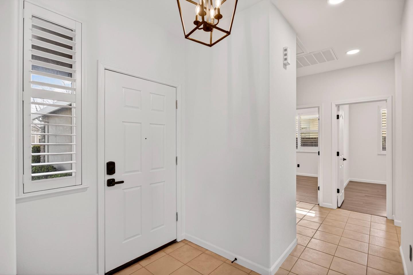 1825 Vermont Street Gridley, CA 95948 - Photo 9 of 57 a bathroom with a granite countertop sink a mirror and a shower