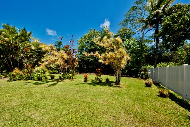 a view of yard with swimming pool