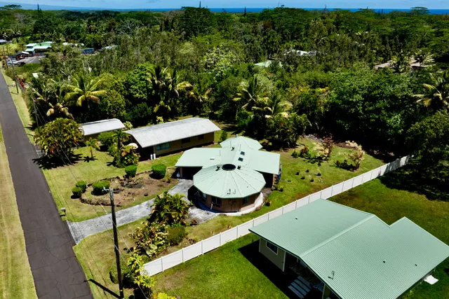 a view of a room with table and chairs