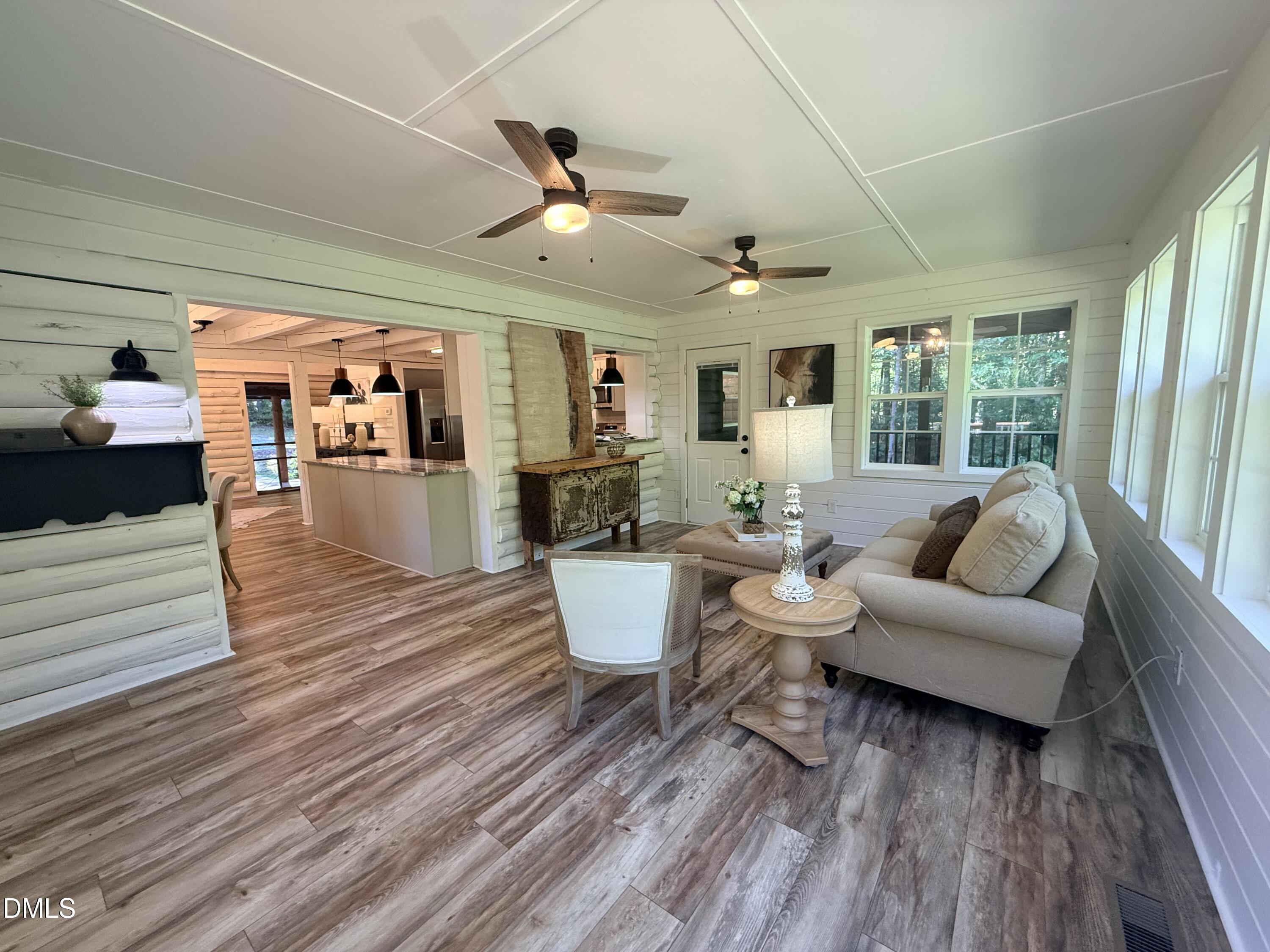 327 Shady Oak Road Roxboro, NC 27574 - Photo 18 of 62 a living room with furniture and a large window