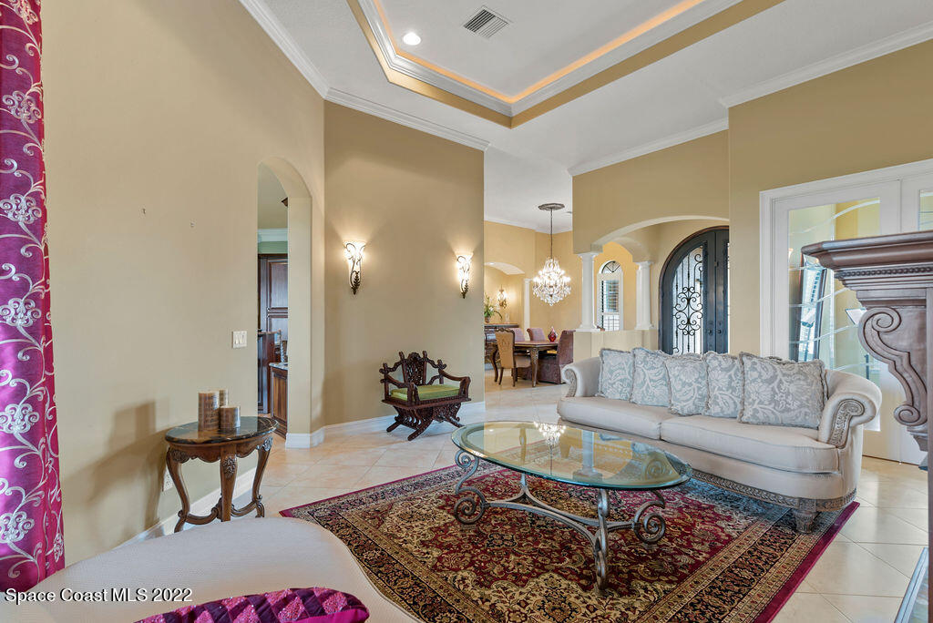 1 Pisces Lane Rockledge, FL 32955 - Photo 16 of 61 a living room with furniture and a rug