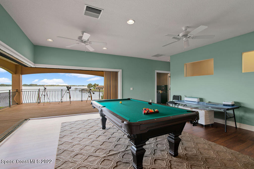 1 Pisces Lane Rockledge, FL 32955 - Photo 2 of 61 a room with furniture pool table and flat screen tv