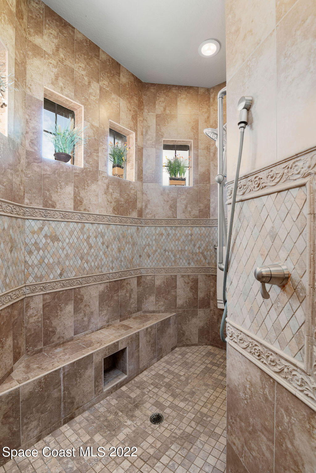 1 Pisces Lane Rockledge, FL 32955 - Photo 24 of 61 a bathroom with a shower
