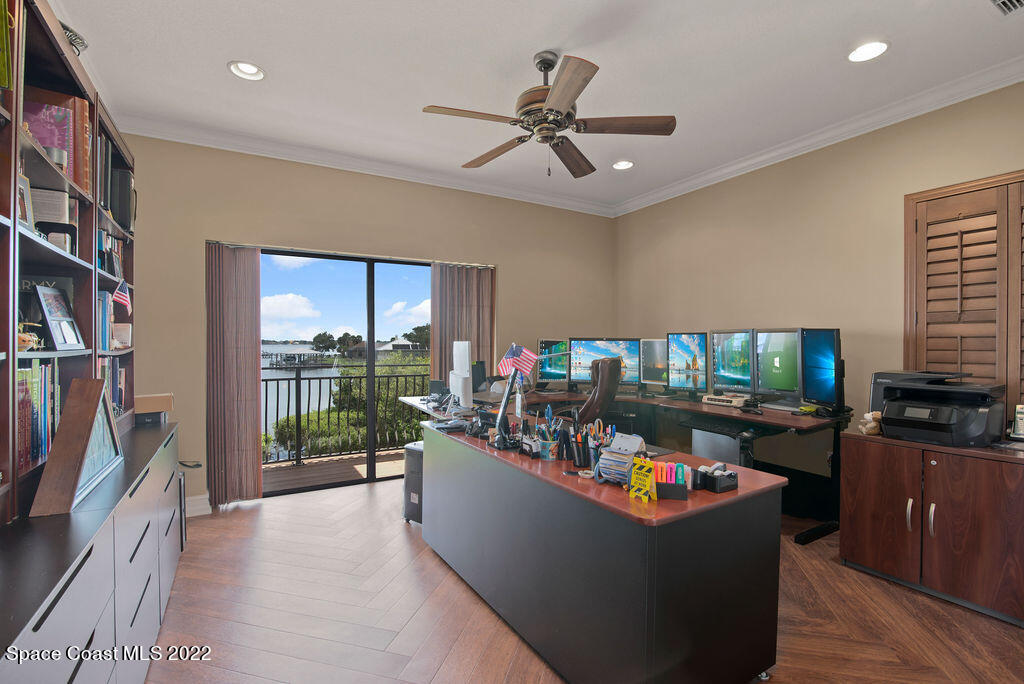 1 Pisces Lane Rockledge, FL 32955 - Photo 41 of 61 a living room with fireplace furniture and a flat screen tv