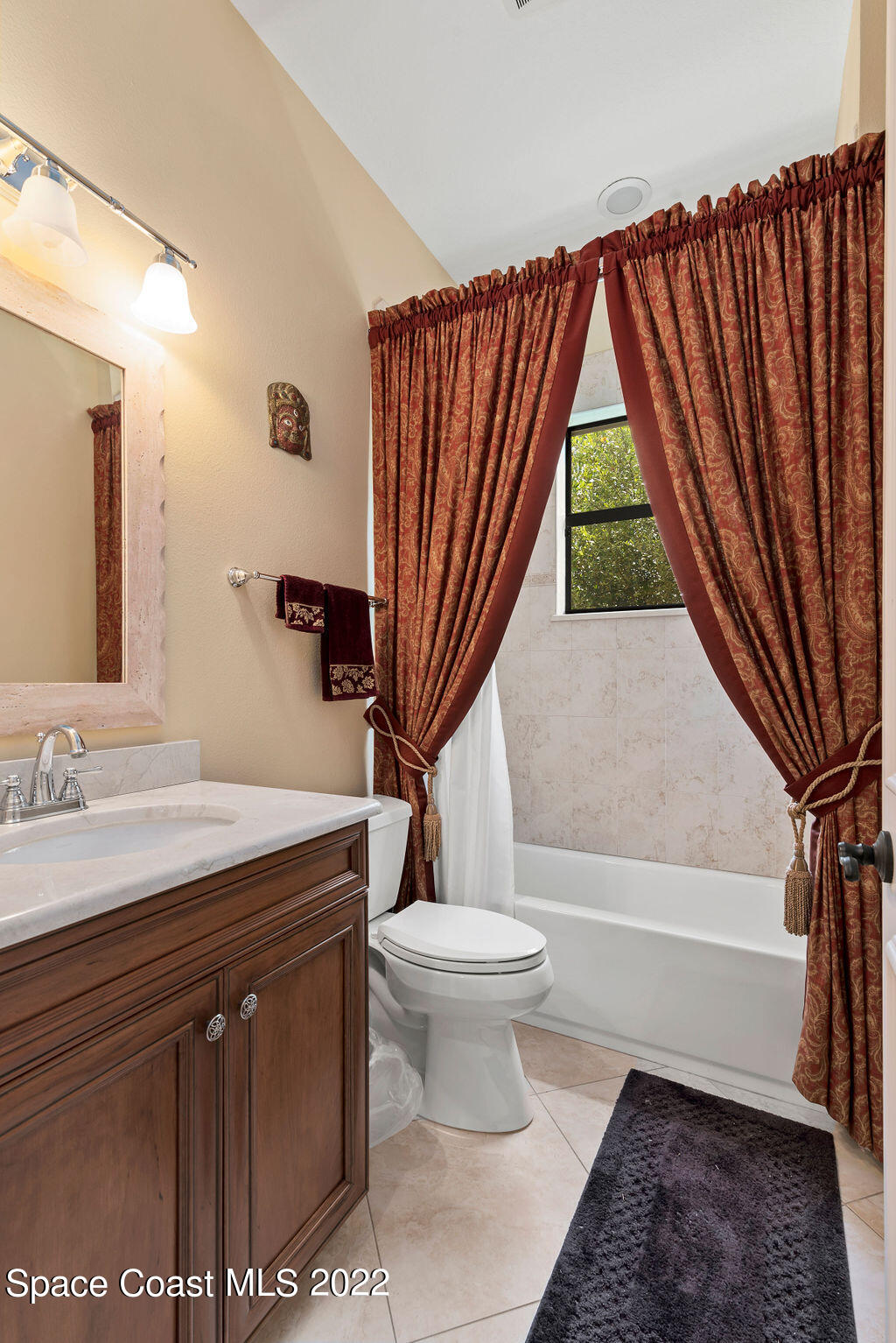 1 Pisces Lane Rockledge, FL 32955 - Photo 54 of 61 a bathroom with a sink a toilet and a bathtub
