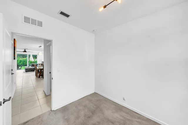 a view of a room with a hallway