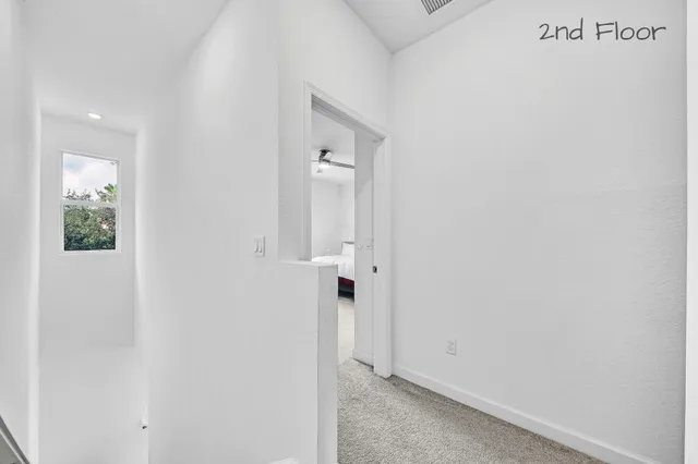 a view of a livingroom with wooden floor