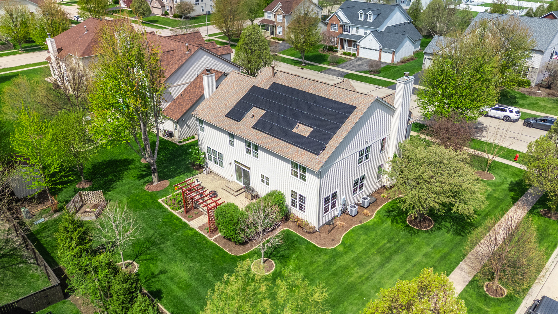 620 Northgate Drive Sycamore, IL 60178 - Photo 11 of 55 an aerial view of a house with backyard