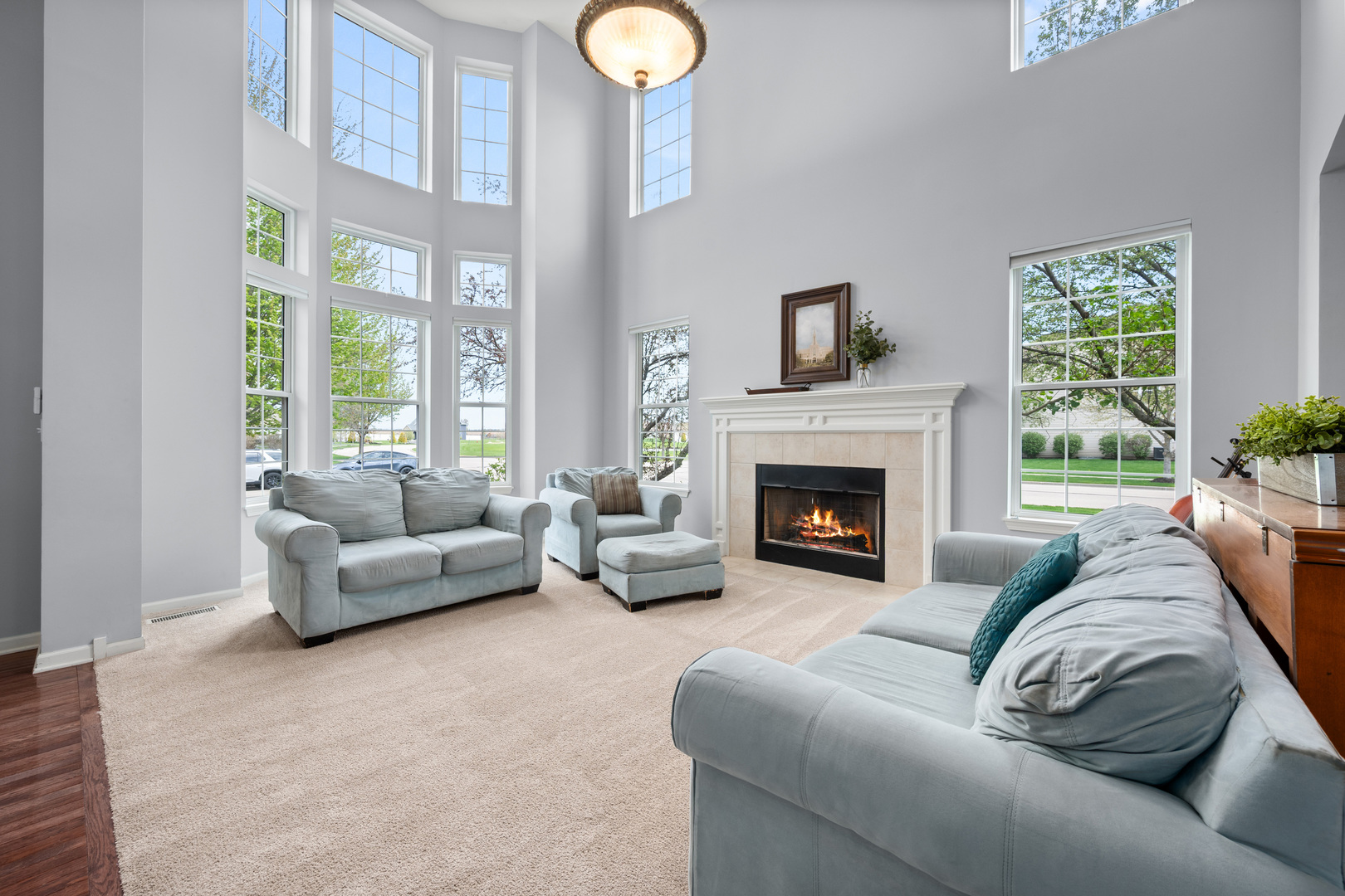 620 Northgate Drive Sycamore, IL 60178 - Photo 13 of 55 a living room with furniture and a fireplace