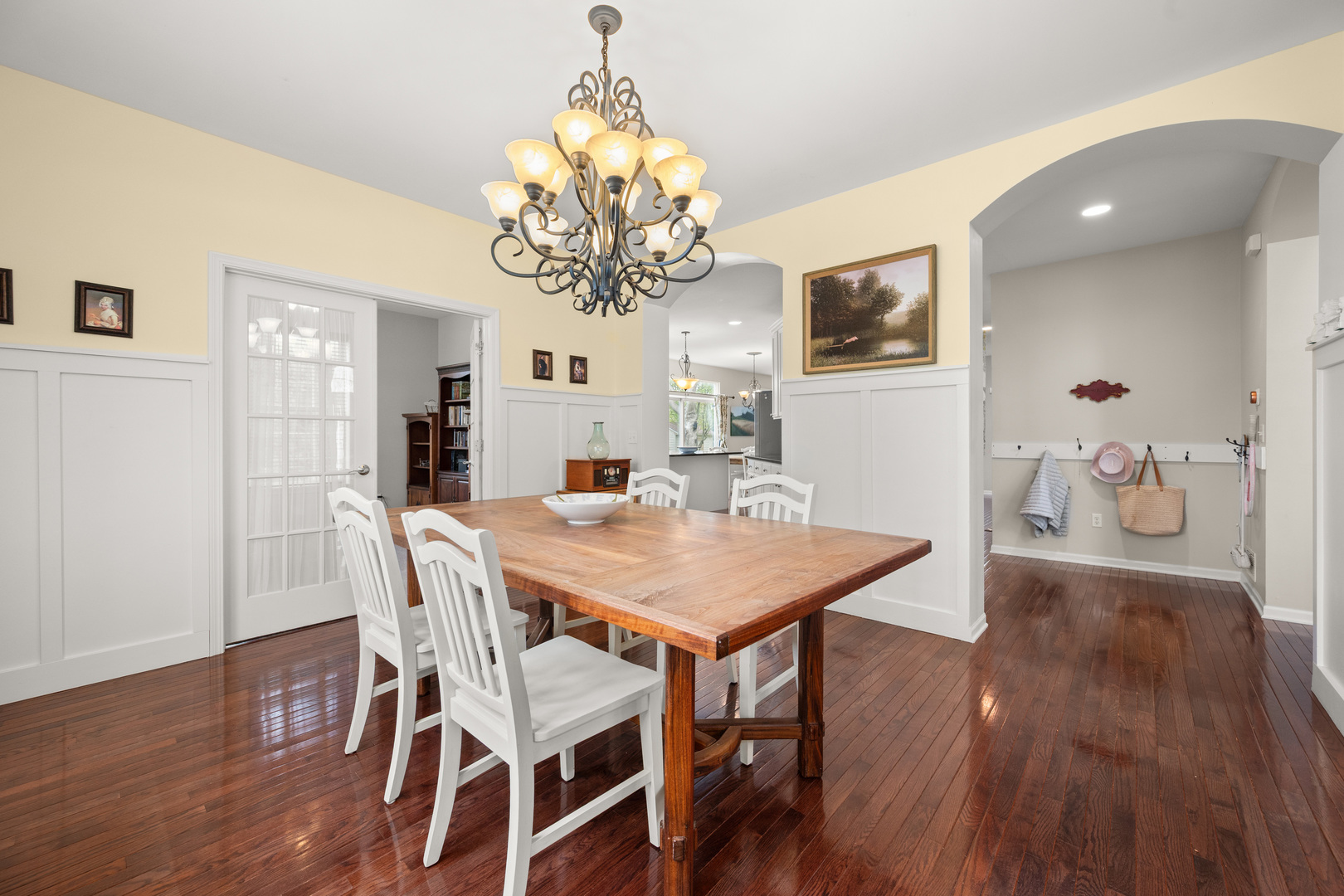 620 Northgate Drive Sycamore, IL 60178 - Photo 18 of 55 a view of a dining room with furniture wooden floor and chandelier