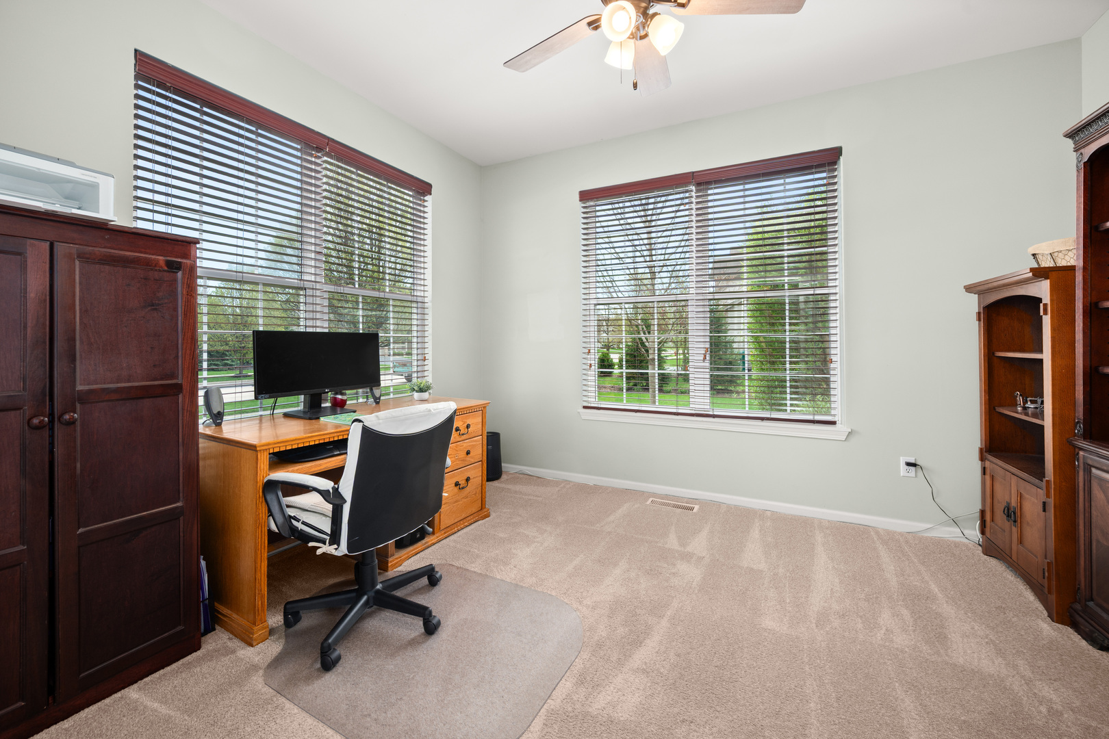 620 Northgate Drive Sycamore, IL 60178 - Photo 19 of 55 a view of a workspace with furniture and a window