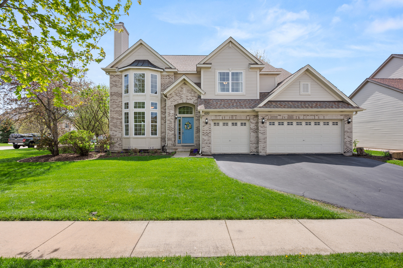 620 Northgate Drive Sycamore, IL 60178 - Photo 3 of 55 front view of a house with a yard