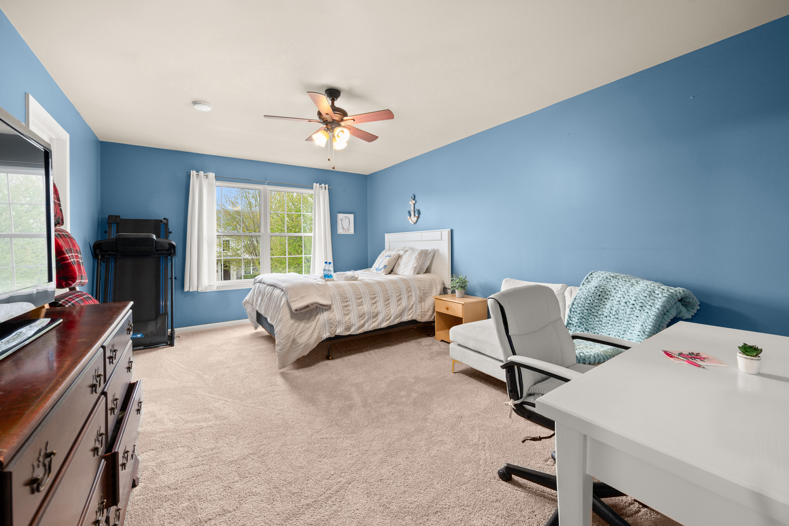 620 Northgate Drive Sycamore, IL 60178 - Photo 42 of 55 a bedroom with a bed and a flat screen tv