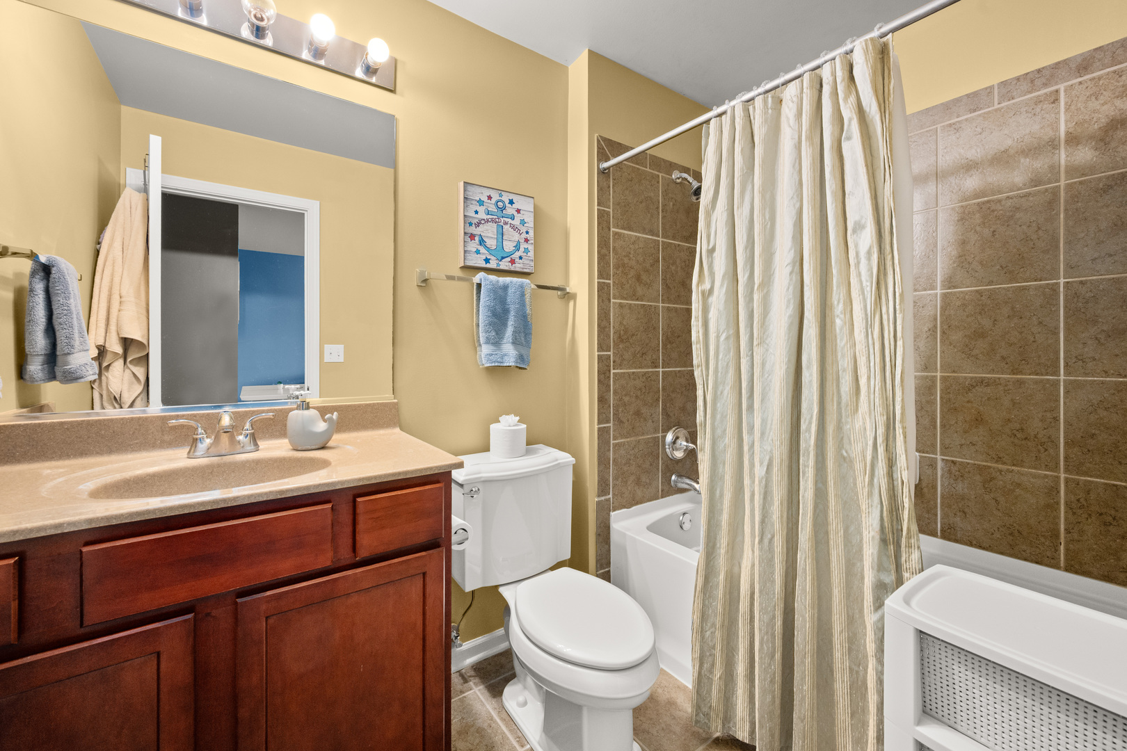 620 Northgate Drive Sycamore, IL 60178 - Photo 44 of 55 a bathroom with a sink a toilet and shower