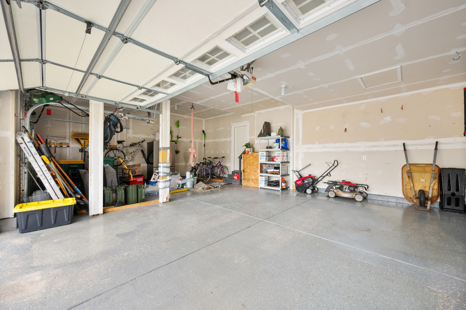 620 Northgate Drive Sycamore, IL 60178 - Photo 49 of 55 a view of a garage with rack and bicycle