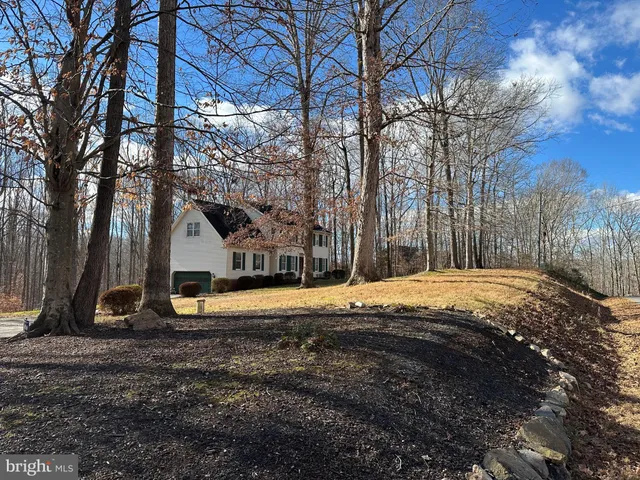 a house with trees in front of it